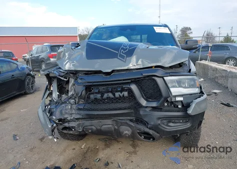 2023 Ram 1500 Rebel 4X4 5'7 Box z USA, uszkodzony, nr VIN 1C6SRFLT3PN677569